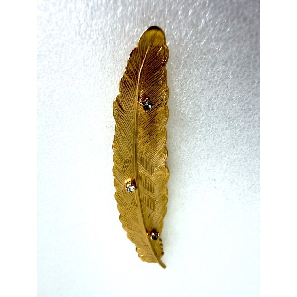 Vintage Gold Tone Rhinestone Feather Pin Brooch Elegant vintage feather-shaped